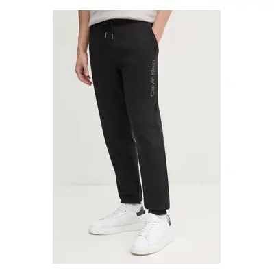 Bavlněné tepláky Calvin Klein černá barva, s aplikací, K10K114254