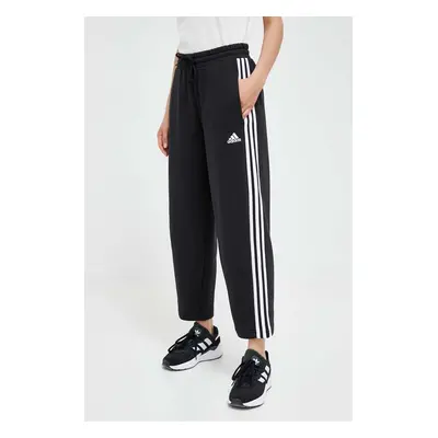 Tepláky adidas černá barva, s aplikací