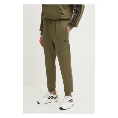 Tepláky adidas Feelcozy zelená barva, s aplikací, JE3812