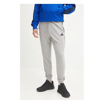 Tepláky adidas Essentials šedá barva, melanžové, JE6346