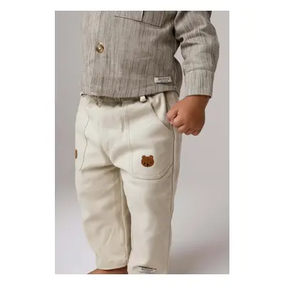 Dětské bavlněné kalhotky Donsje Kassim Trousers Bear béžová barva, 4096301