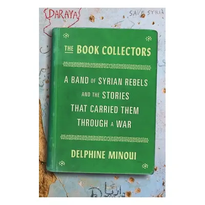 "The Book Collectors: A Band of Syrian Rebels and the Stories That Carried Them Through a War" -