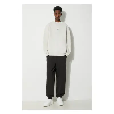 Bavlněné tepláky Puma MMQ Sweatpants černá barva, 624007