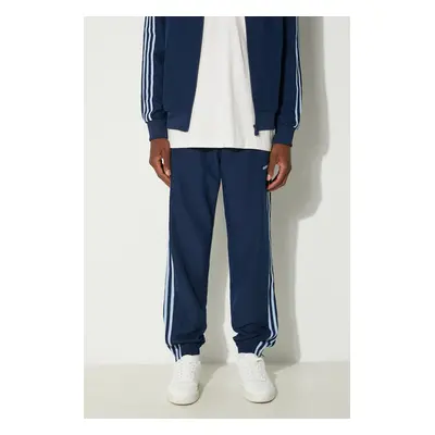 Tepláky adidas Originals tmavomodrá barva, s aplikací, IX9625