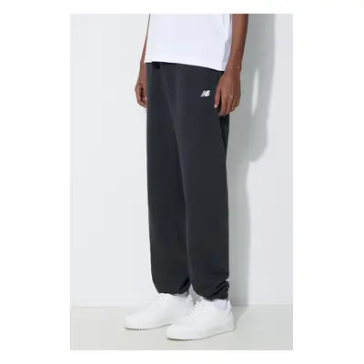 Tepláky New Balance Essentials French Terry Jogger černá barva, hladké, MP41519BK