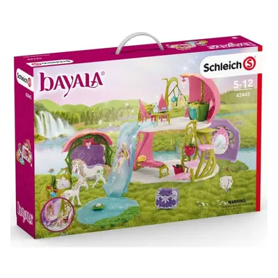 Schleich 42445 třpytivý květinový dům s jednorožci, jezerem a stájí