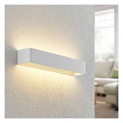 Arcchio Arcchio LED nástěnné svítidlo Karam, 53 cm, bílé, kov, nahoru/dolů