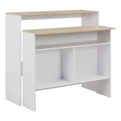 vidaXL Barový stůl se 2 stolními deskami bílý a dub 130 x 40 x 120 cm