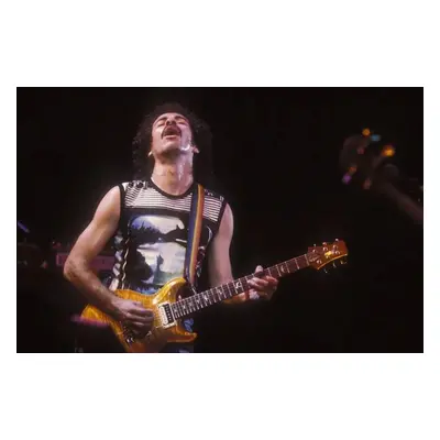 Fotografie Guitarist Carlos Santana on stage., 1985