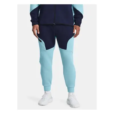 Modré sportovní tepláky Under Armour UA Unstoppable Flc Joggers 90426159