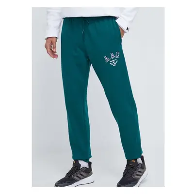 Bavlněné tepláky adidas Originals zelená barva, s aplikací 86297068