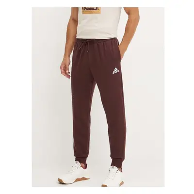 Tepláky adidas Essentials hnědá barva, s aplikací, IY9086 97843922