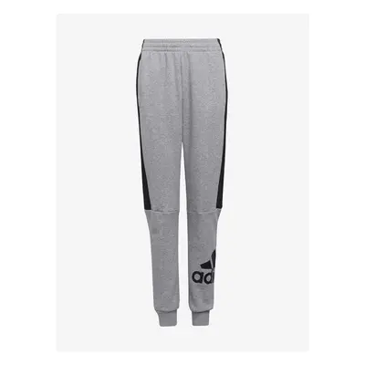 Šedé klučičí žíhané tepláky adidas Performance - unisex 91217138