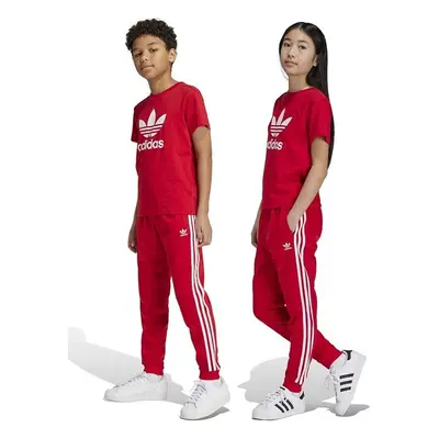 Dětské tepláky adidas Originals SST TRACK PANTS červená barva, s 99233351