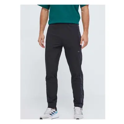 Tepláky adidas Originals černá barva, hladké 86410305