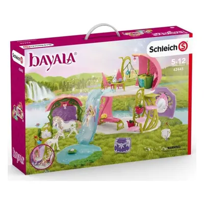 Schleich 42445 Třpytivý květinový dům s jednorožci, jezerem a stájí