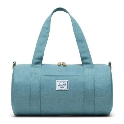 Sportovní taška HERSCHEL Sutton Mini Oil Blue Crosshatch