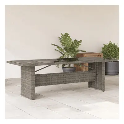 vidaXL Zahradní stůl se skleněnou deskou šedý 240x90x75 cm polyratan