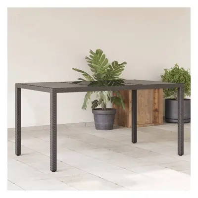 vidaXL Zahradní stůl se skleněnou deskou černý 150x90x75 cm polyratan