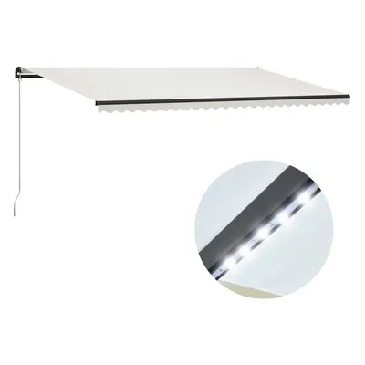 vidaXL Ručně zatahovací markýza s LED světlem 600 x 300 cm krémová