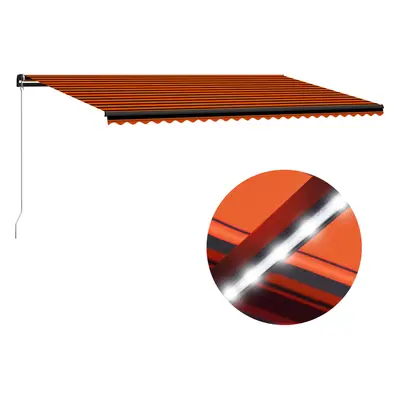 vidaXL Ručně zatahovací markýza s LED světlem 600x300 cm oranžovohnědá