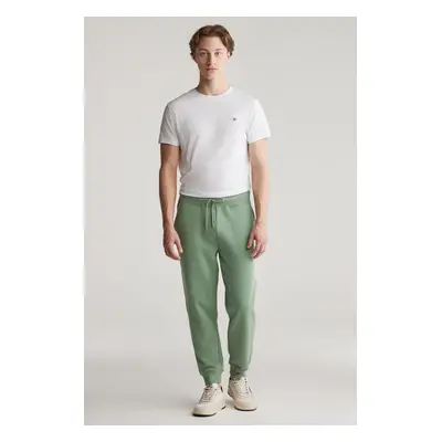 TEPLÁKY GANT REG SHIELD SWEATPANTS KALAMATA GREEN